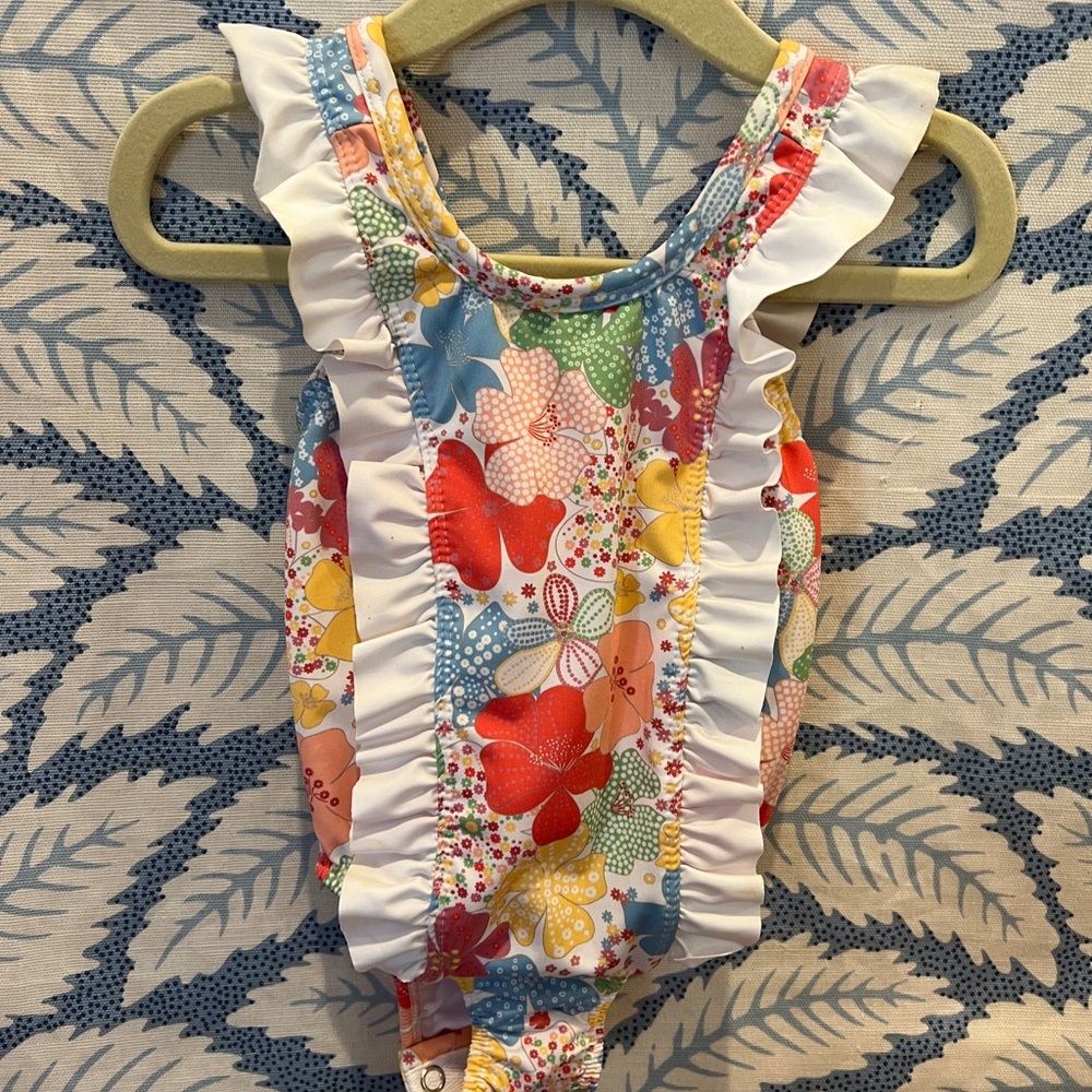 EUC Little English floral girls swimsuit. 12 months. Snaps for diaper